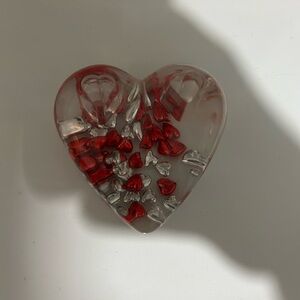 Vintage Lucite heart-shaped paper weight and pen holder.